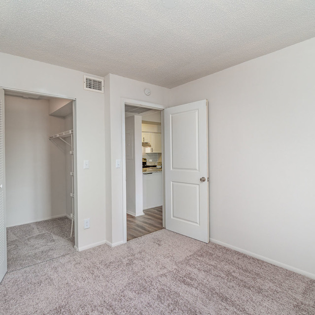 The Park at Positano - Empty Space Room with Carpeted Floor